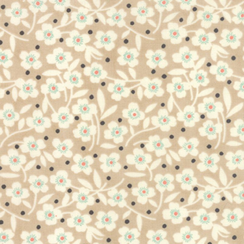 Beige dotter på lys bunn