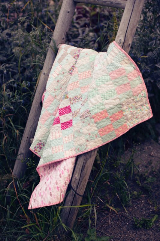 Babyteppe i pasteller 